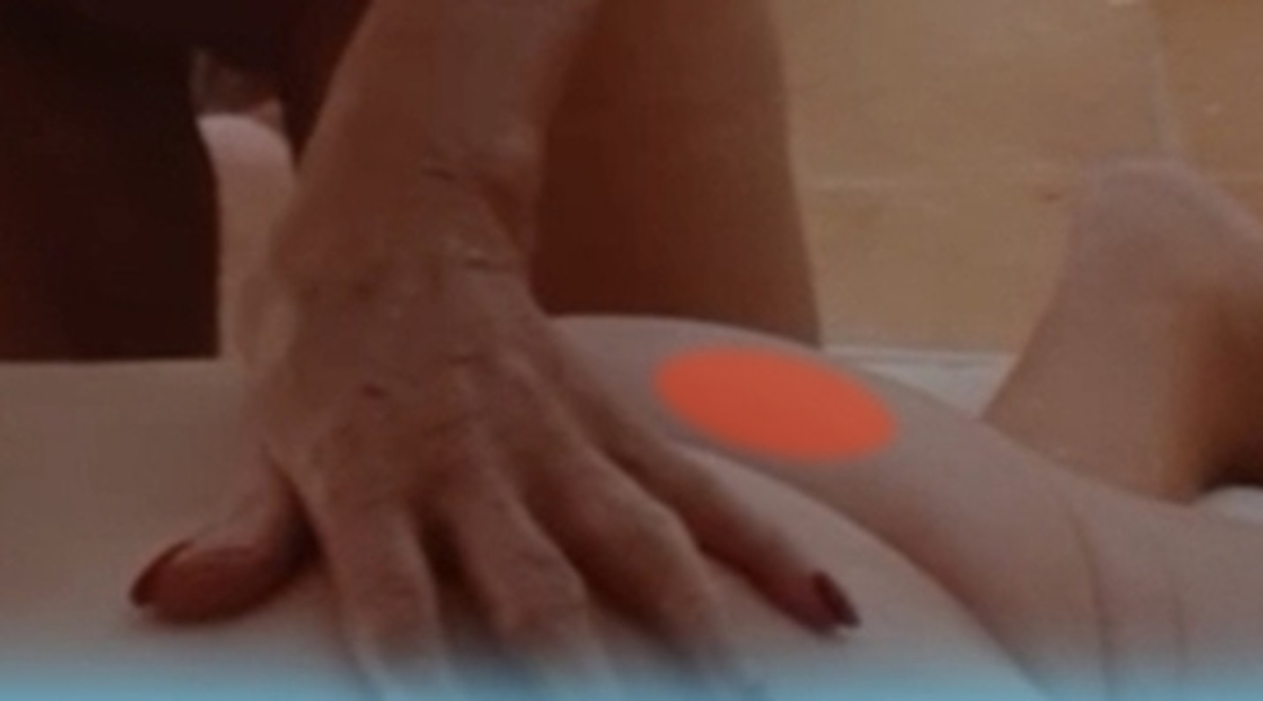 Yvonne's hand massaging a man's buttock. The other buttock is reddened from the punishment he so desperately wanted her to do