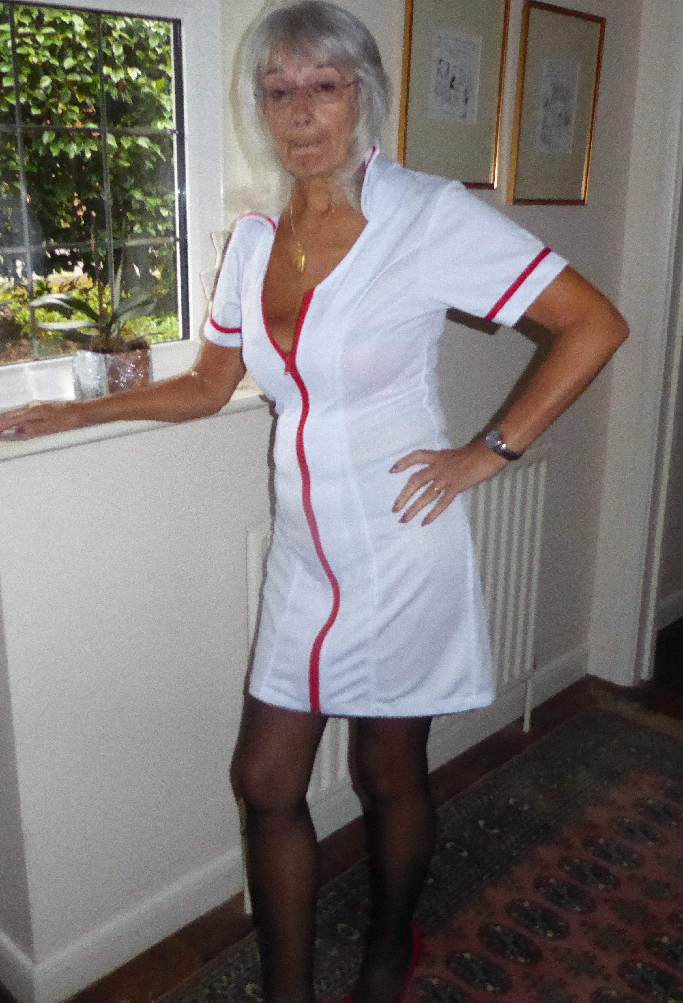 Yvonne in her nurse costume, just one of many costumes you can request