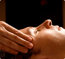 A side view of man enjoying an Indian Head Massage
